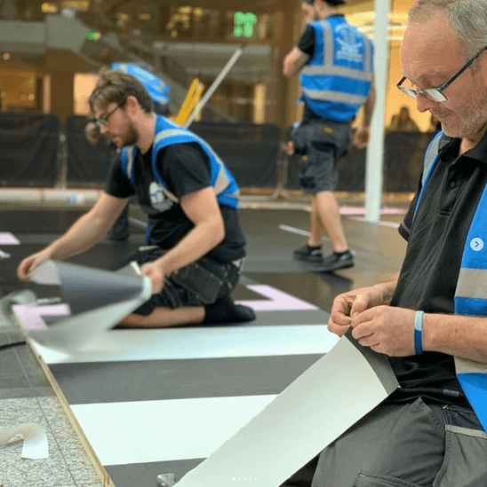 Professional exhibition display with branded carpentry